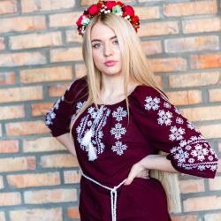 Burgundy blouse with white oament