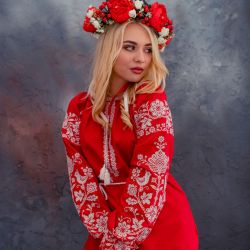Red blouse with white embroidery