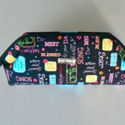 Cosmetic bag with frame