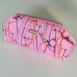Pink cosmetic bag for travelling
